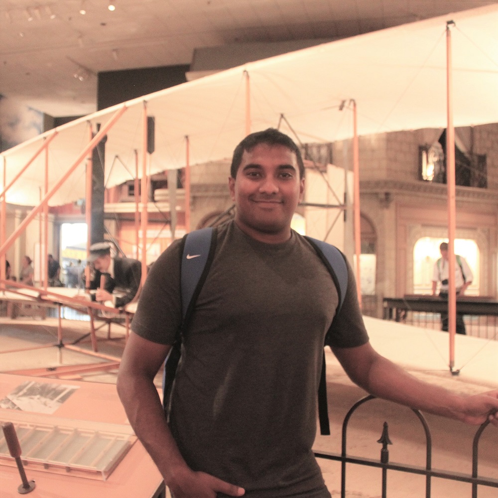 Anton Amaratunge infront of the Wright Flyer aircraft
