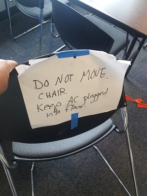 Chair with sign